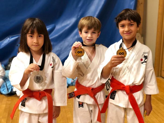 Young Rokah Karate students with tournament medals